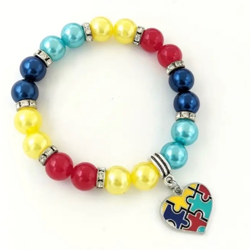 Colorful Beaded Bracelet with Puzzle Heart Charm